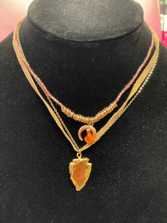 Arrow necklace with orange stone